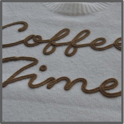 Chain-stitch embroidery on a knitted panel